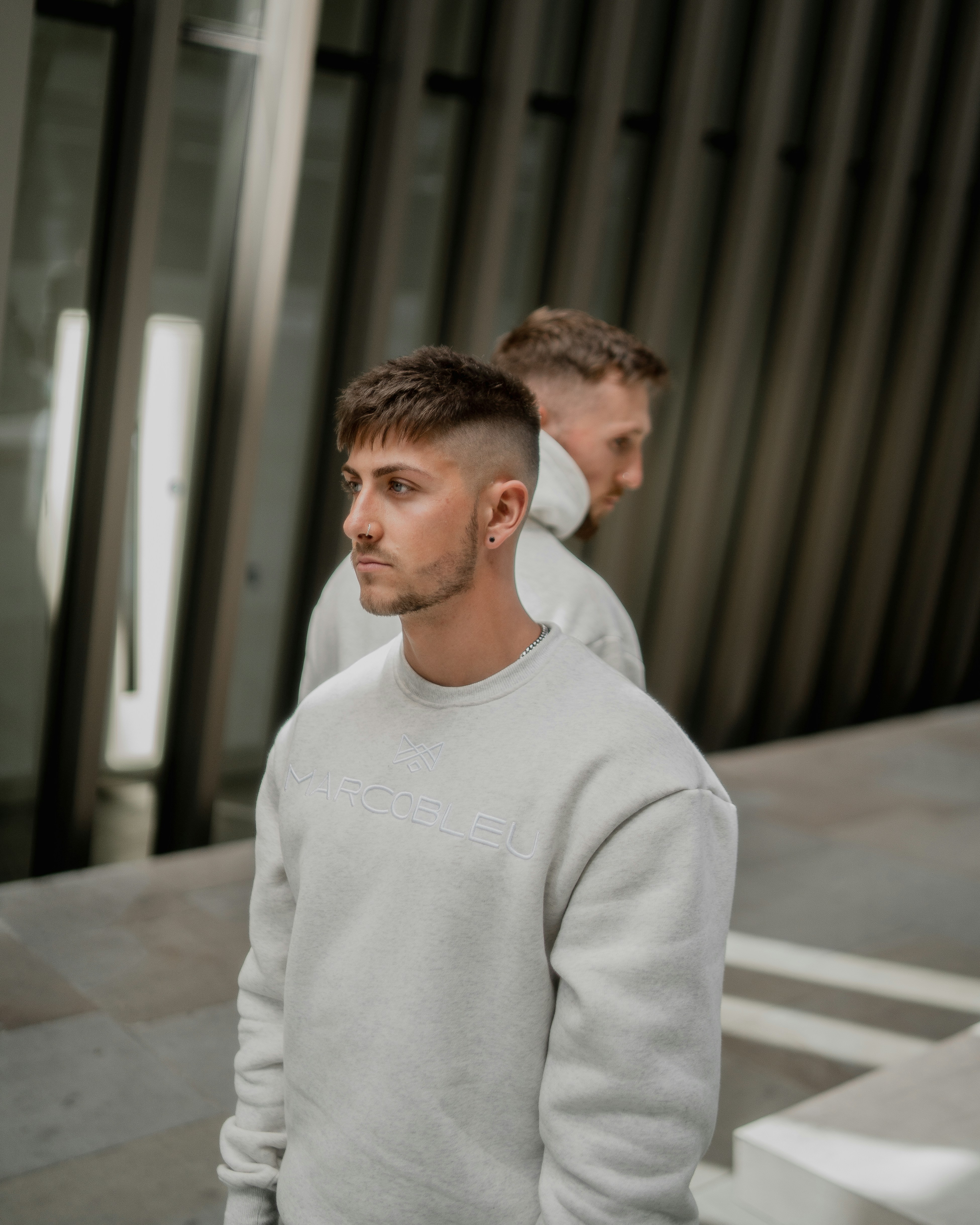 a man looking at another man