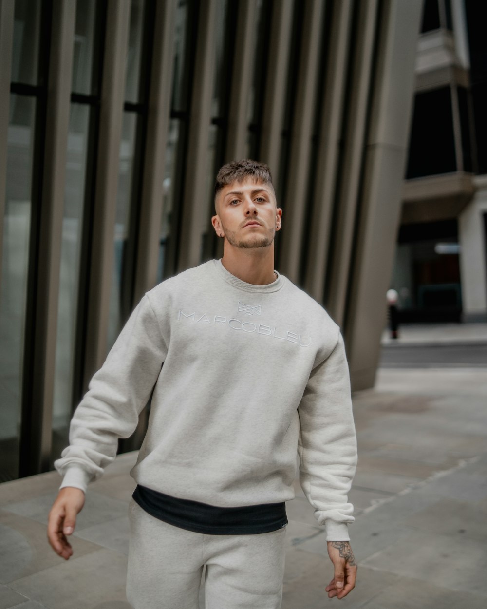 a man wearing a white shirt