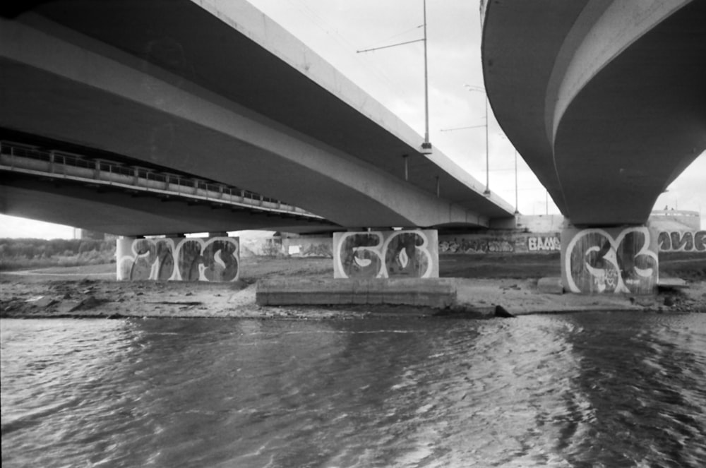 a large pipe going into a body of water