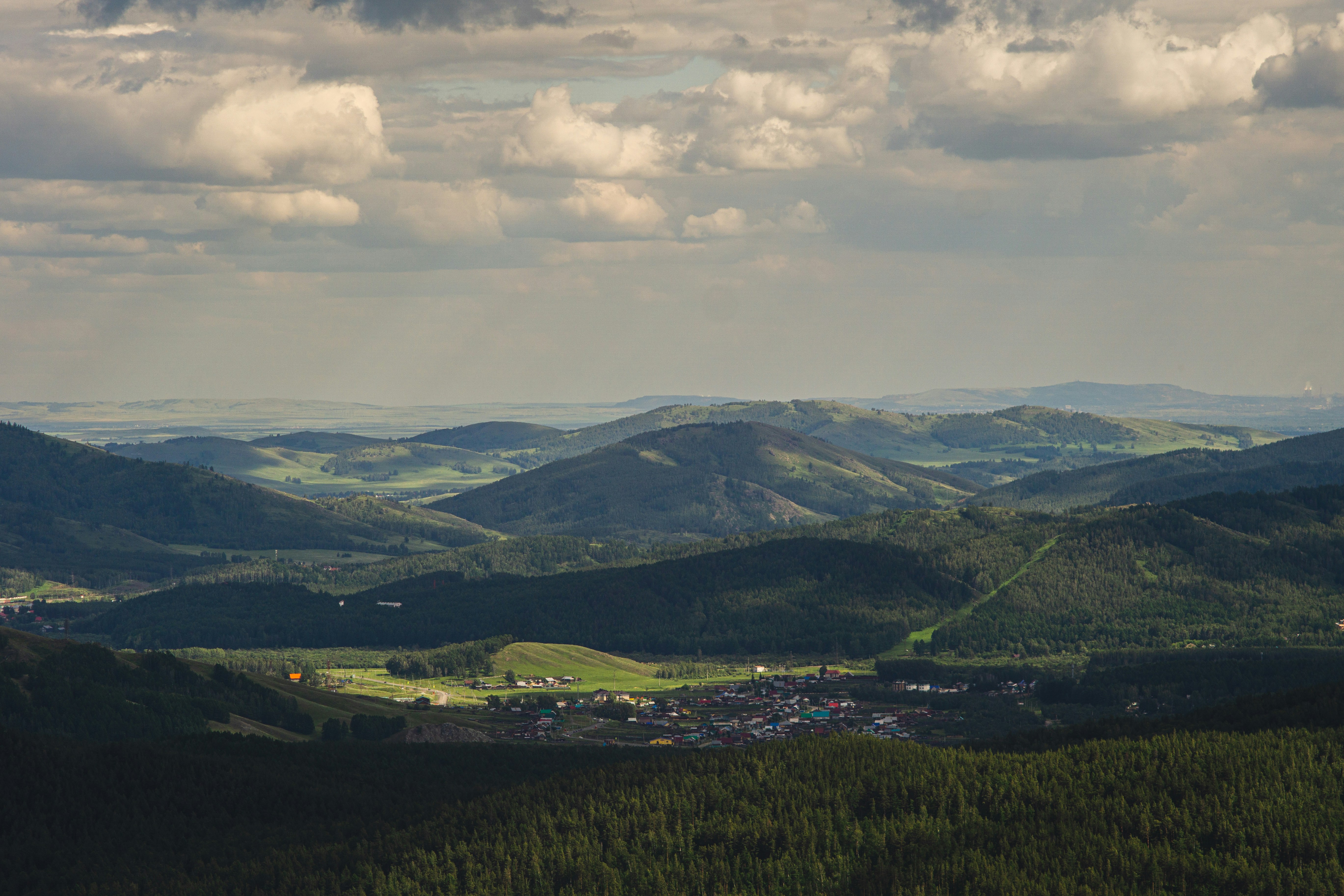a landscape with hills and trees