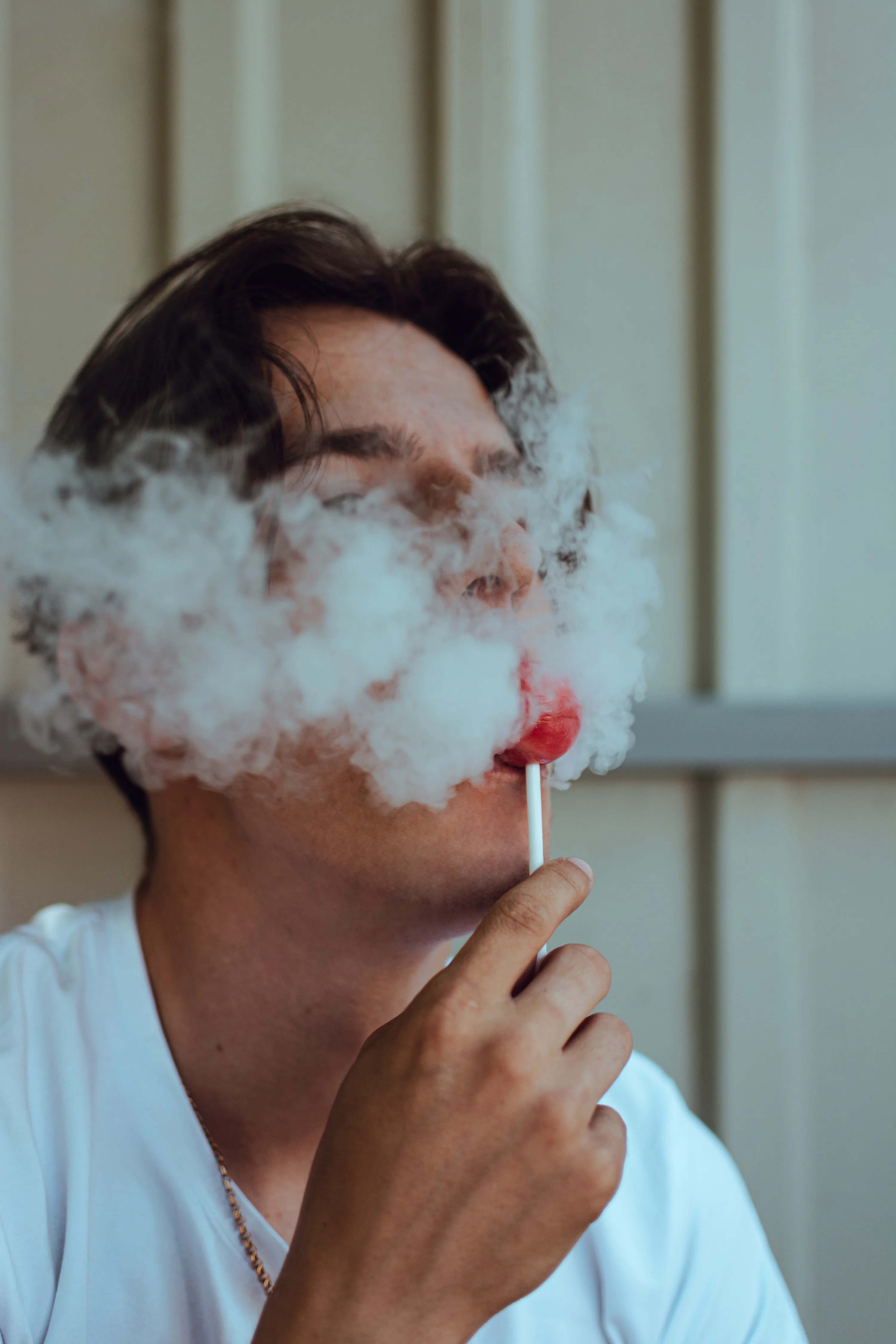holding cigarette smoke in mouth Man young hi-res stock photography and images How to Hold a Cigar