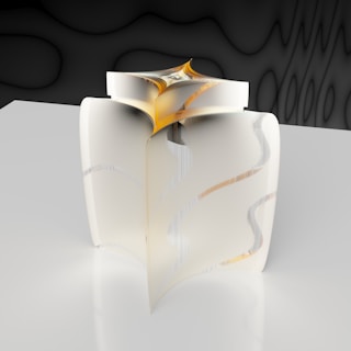 A delicate sculpture with smooth curves and vibrant accents, set against a neutral background.