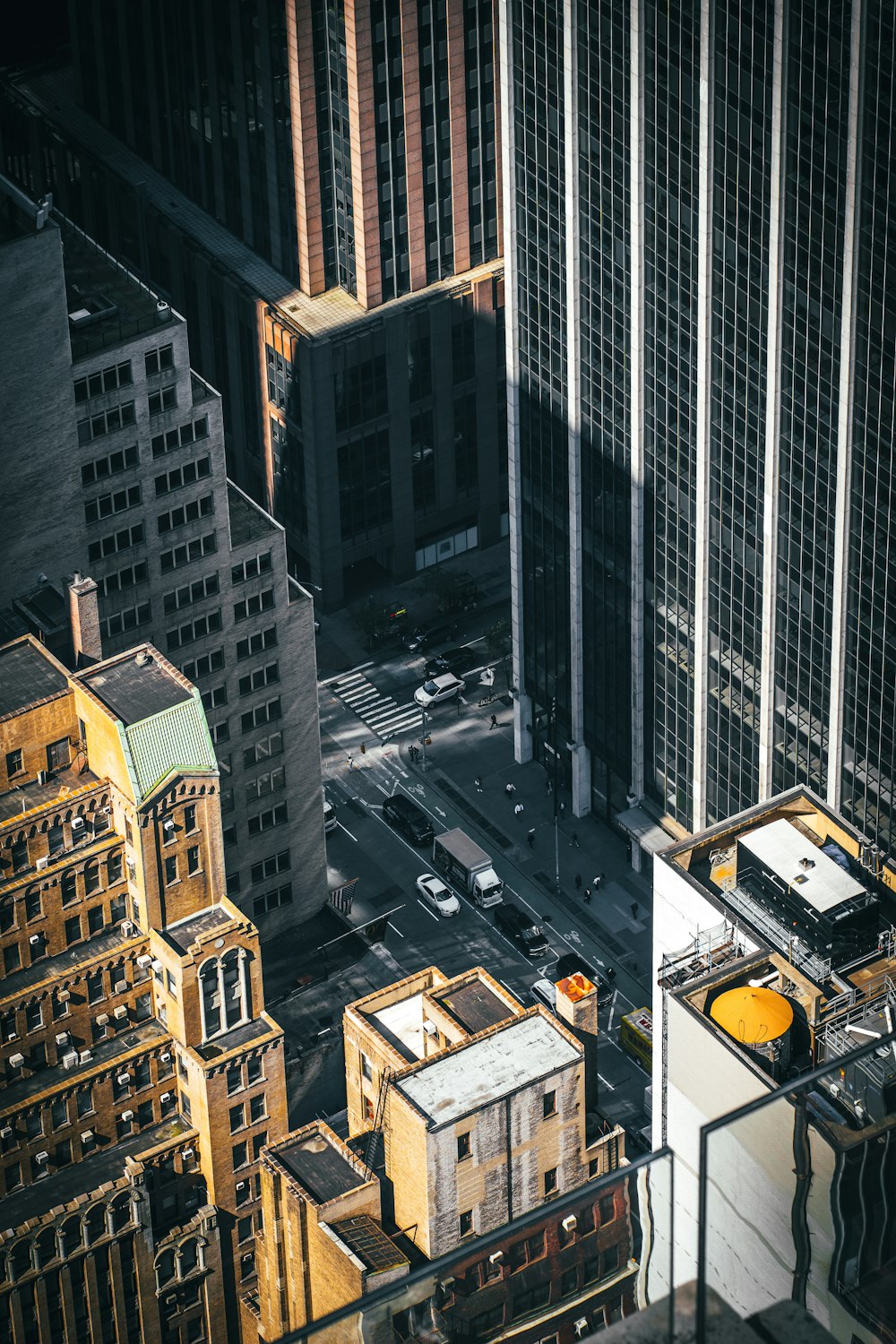 a street with cars and buildings