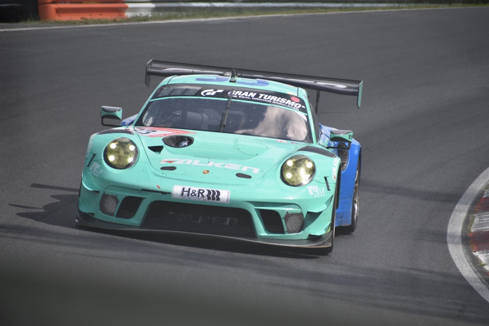 a blue race car on a track