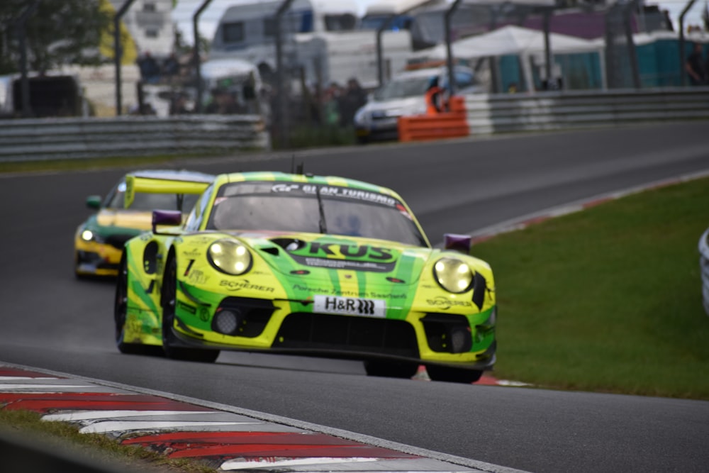 a group of race cars on a track