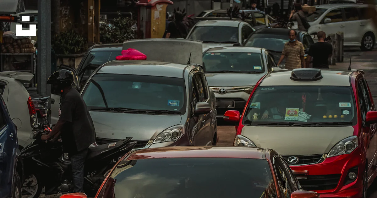 A group of cars parked in a parking lot photo – Free Honda civic Image ...