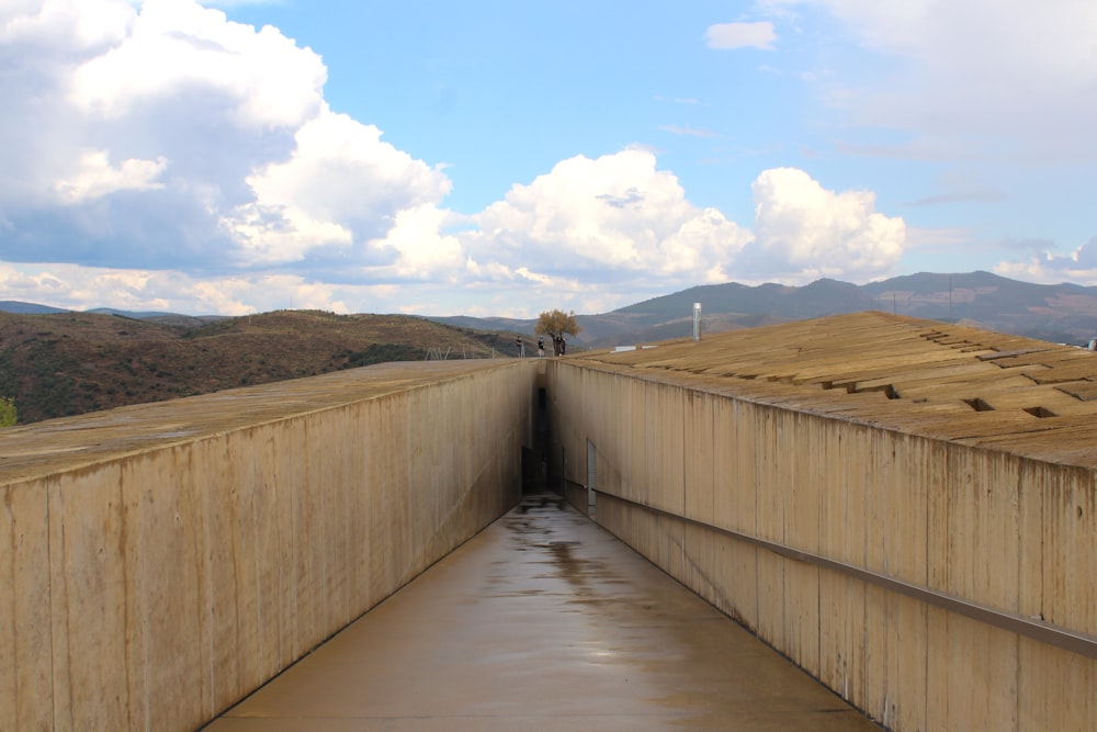 a long wall with a walkway