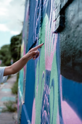 a person painting a wall