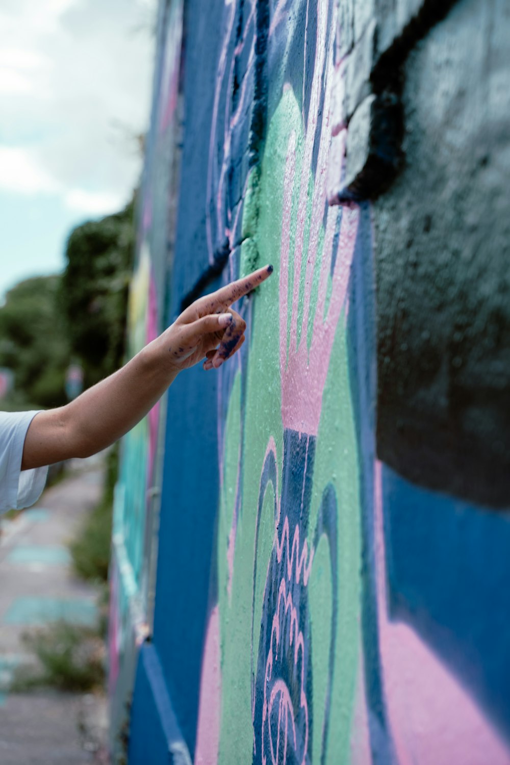 a person painting a wall