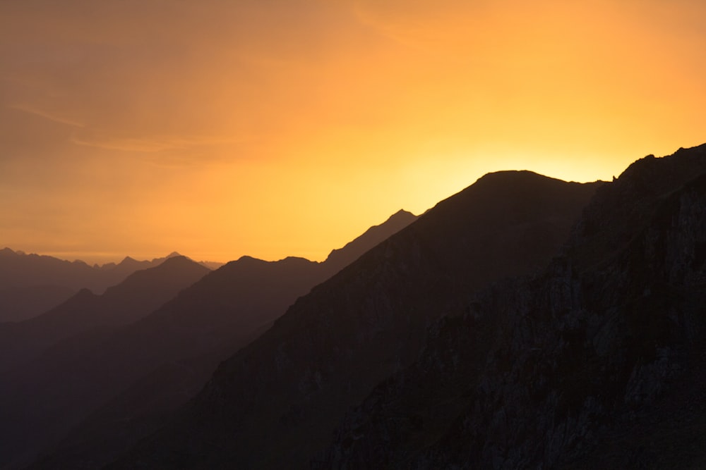 a mountain range with a sunset