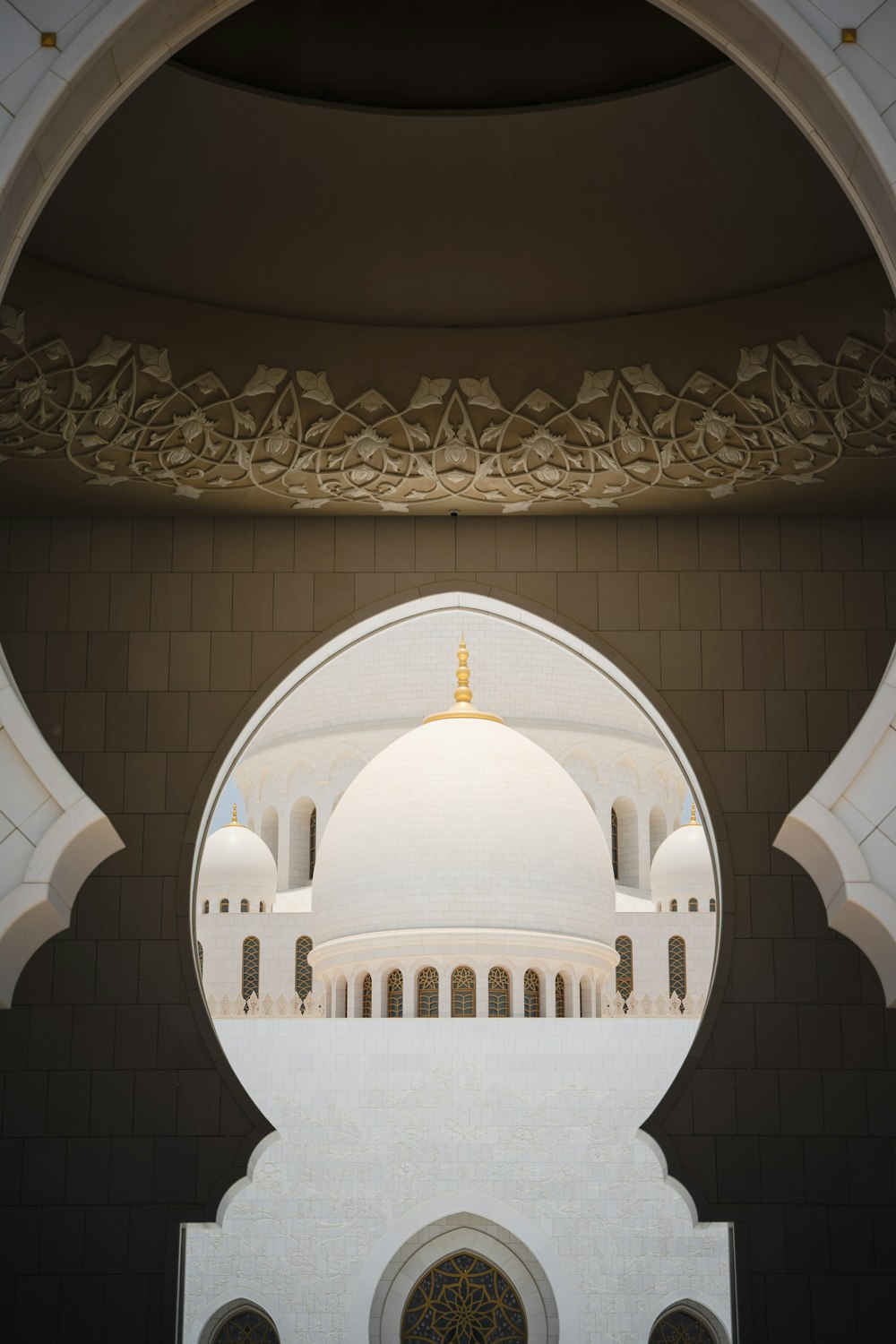 a domed building with a gold cross