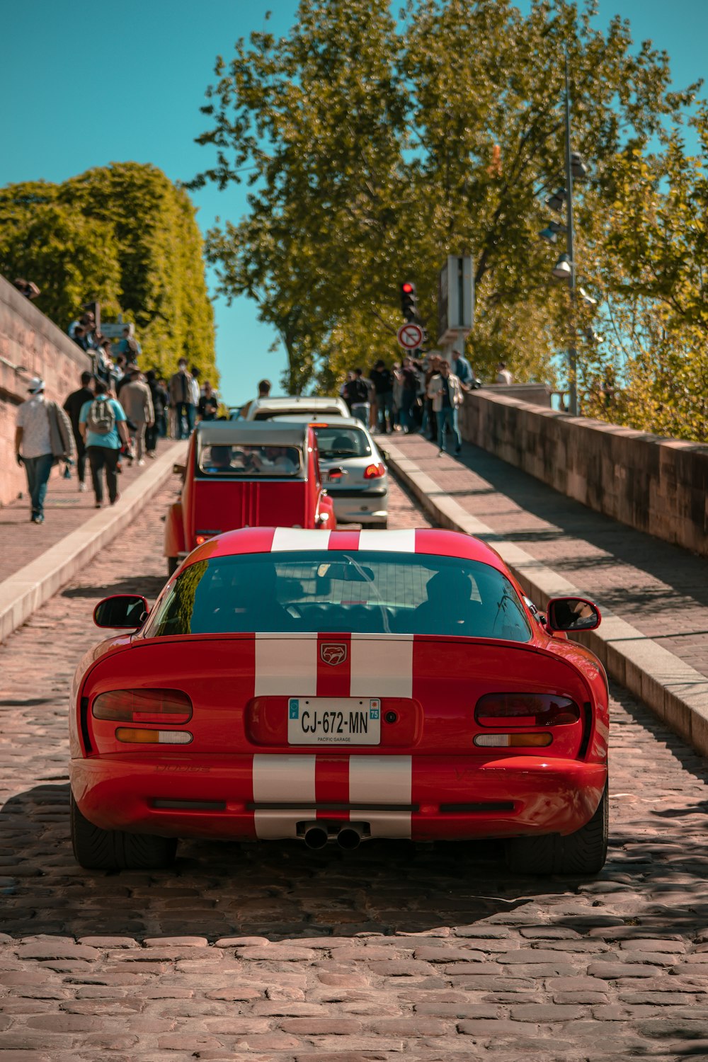 a group of cars parked on the side of a road