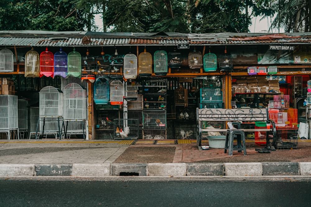 a store front with a table and chairs