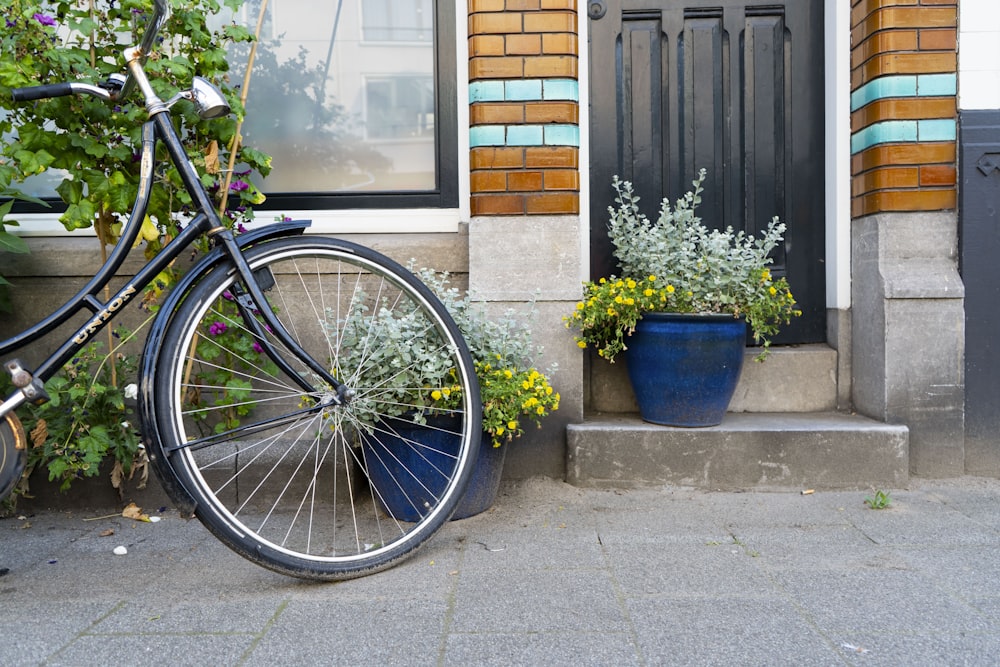 a bicycle parked in front of a house