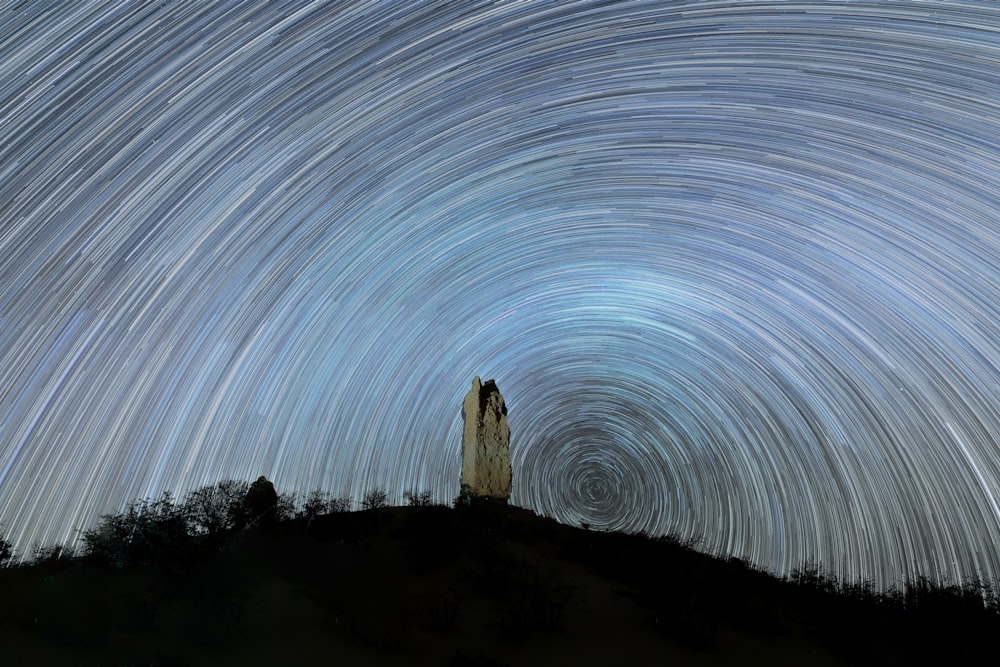 a mountain with stars in the sky