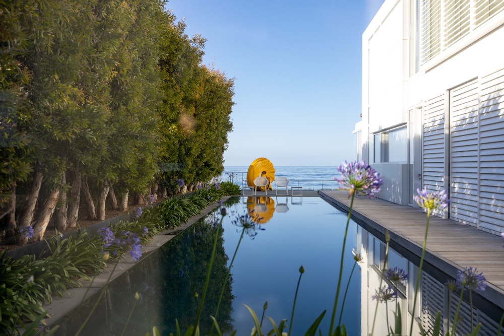 a swimming pool with a yellow floating object in it