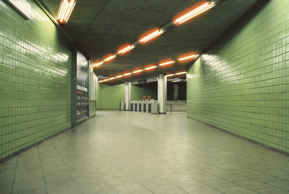 a hallway with green walls