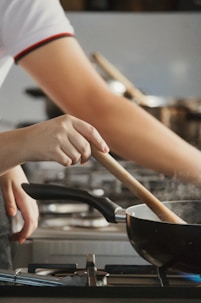 a person holding a stick