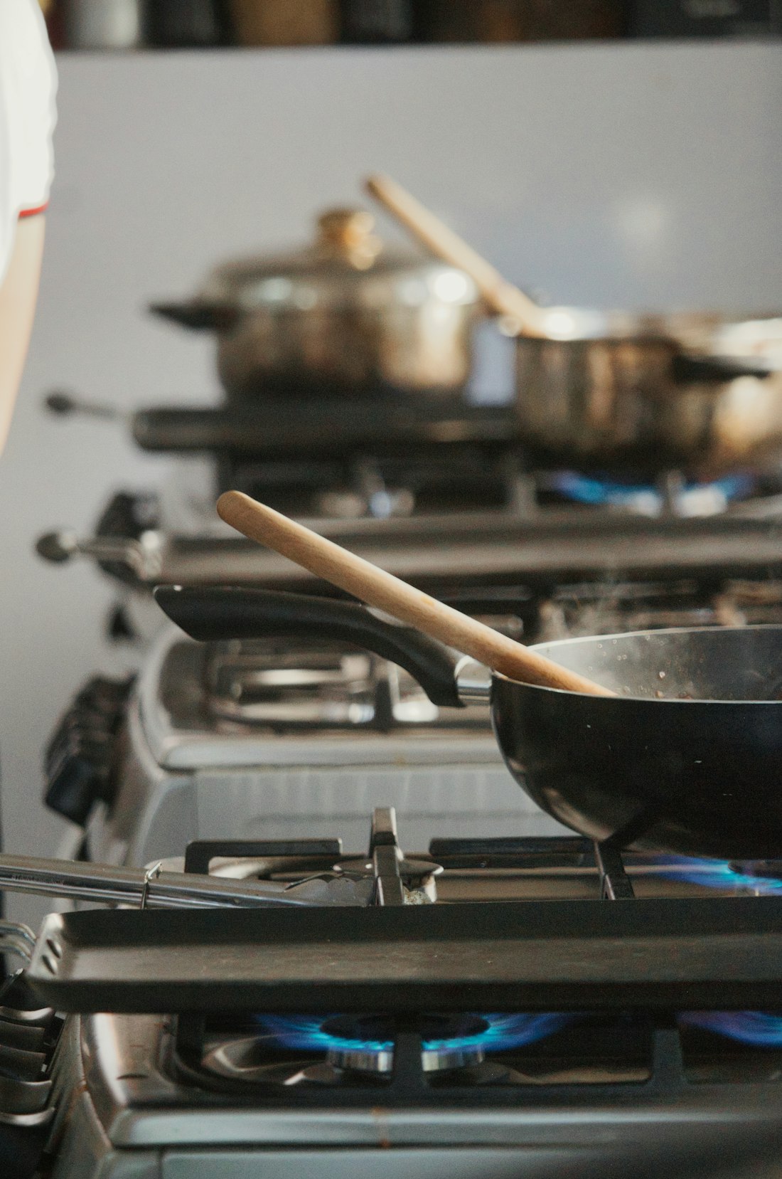 A pan cooking food on a stovetop