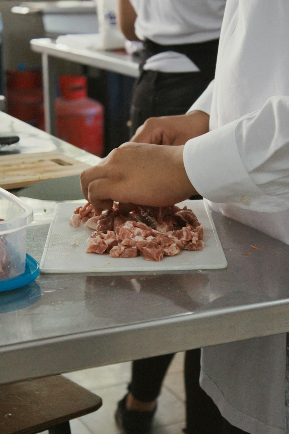 a person holding a tray of food