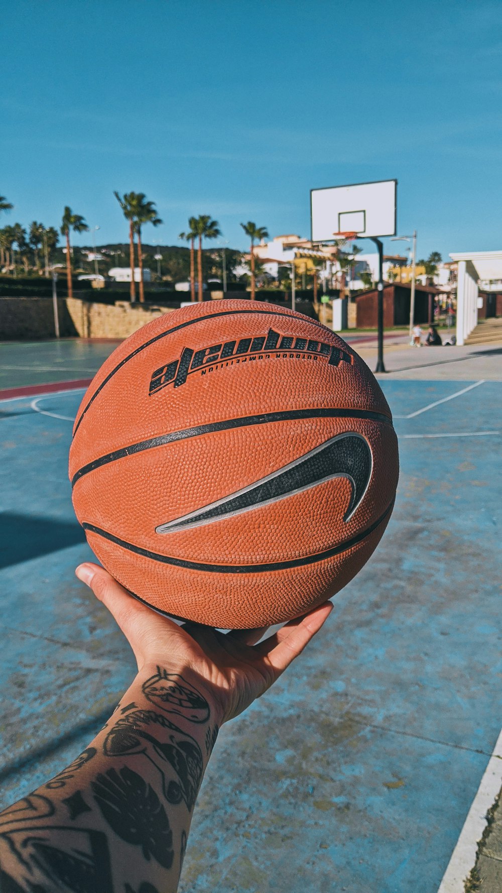 a person holding a basketball