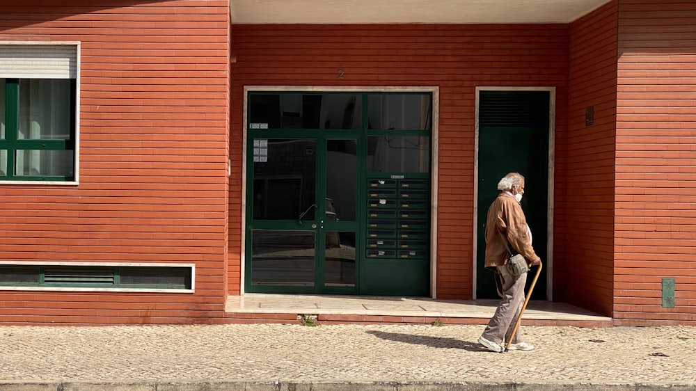 a person walking with a broom