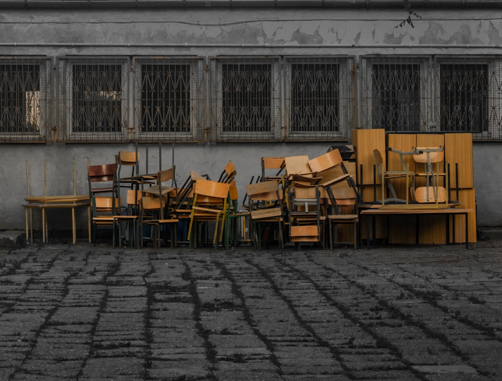 Stacks of old chairs cleared from a building