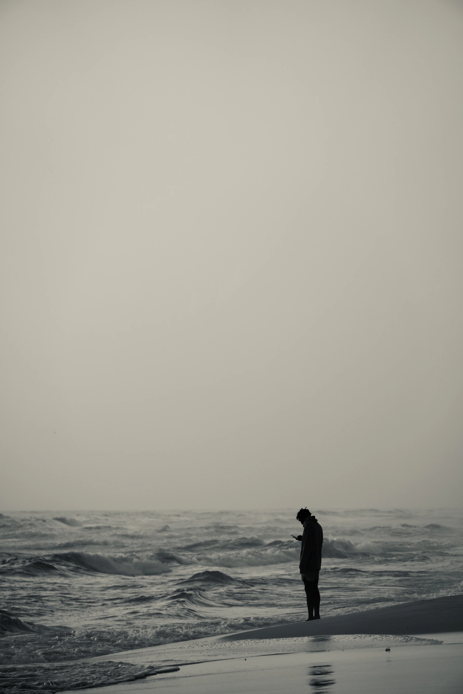 a person standing on a beach