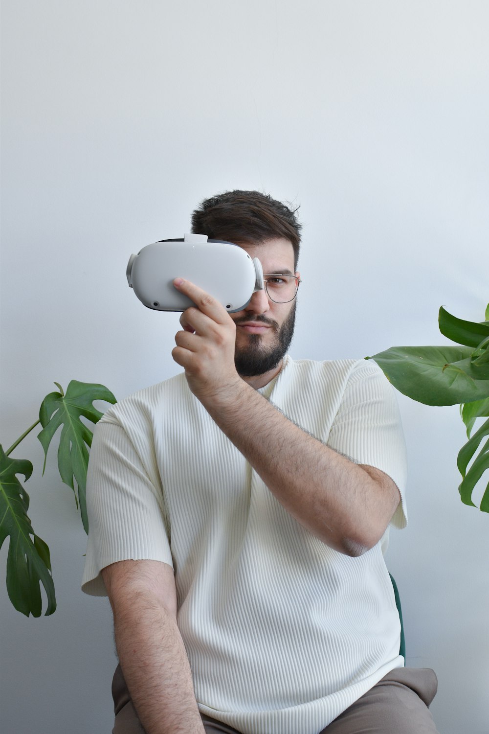 a man holding a white mug