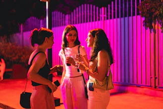 a group of women standing on a stage