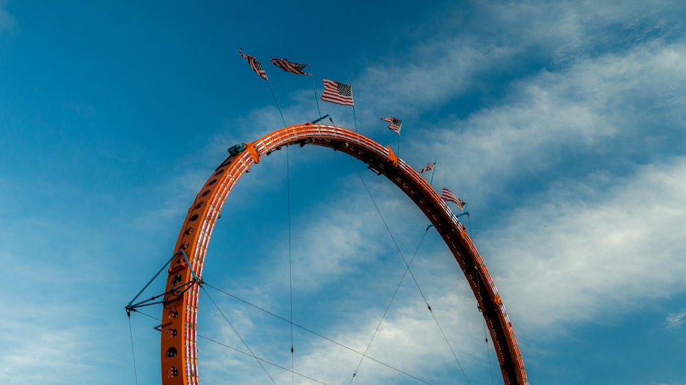 a ferris wheel with flags