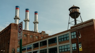 a building with smokestacks