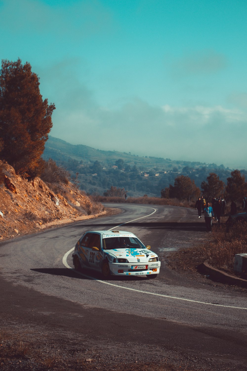 a police car driving down a road