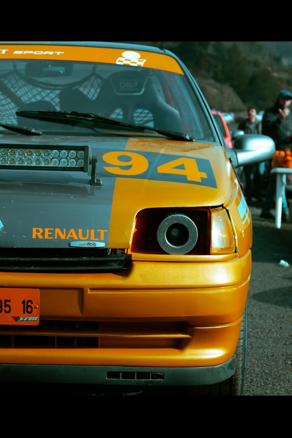 the front of a yellow car