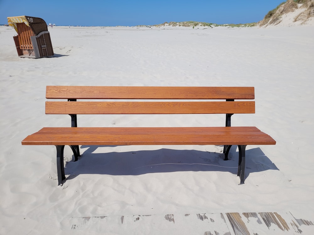 a bench in the snow