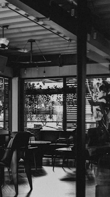 a room with tables and chairs