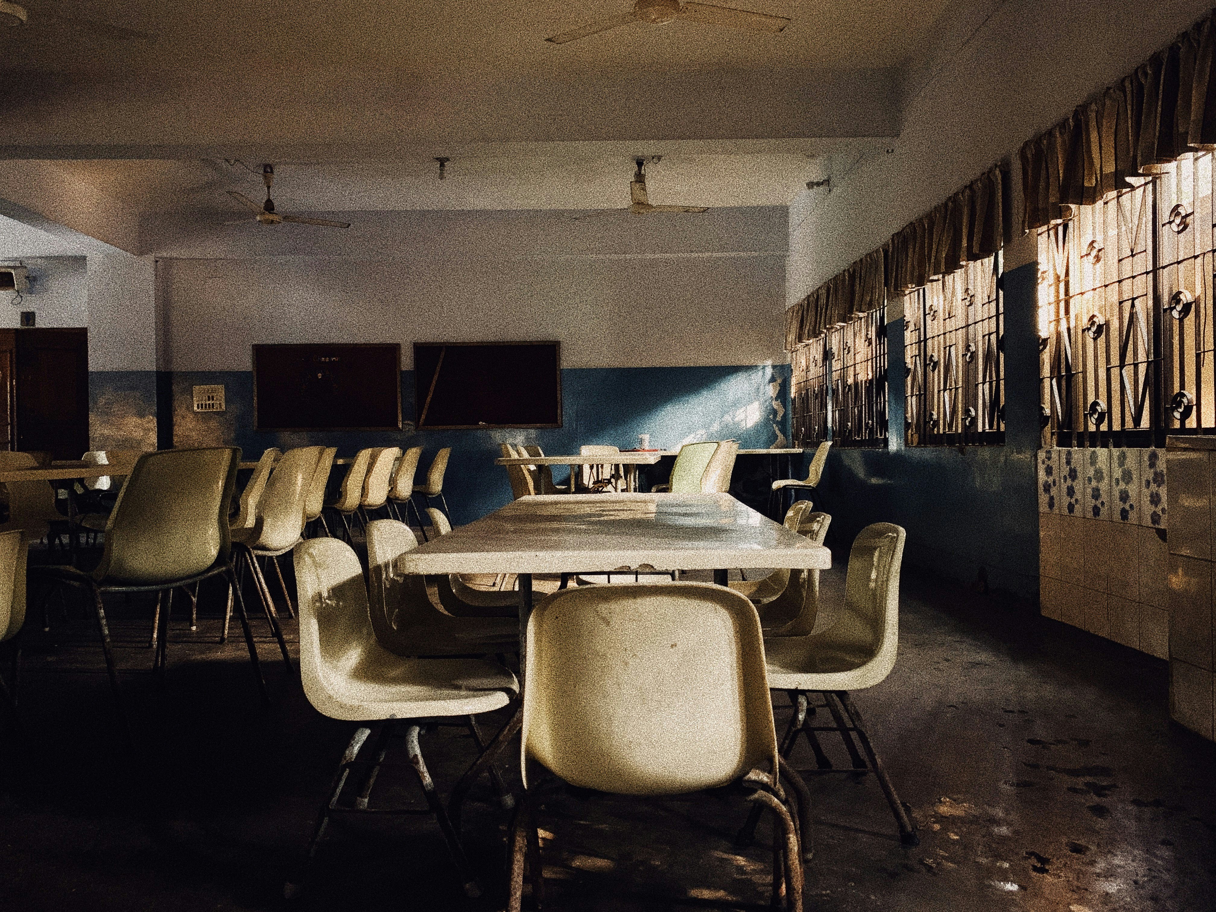 a room with tables and chairs