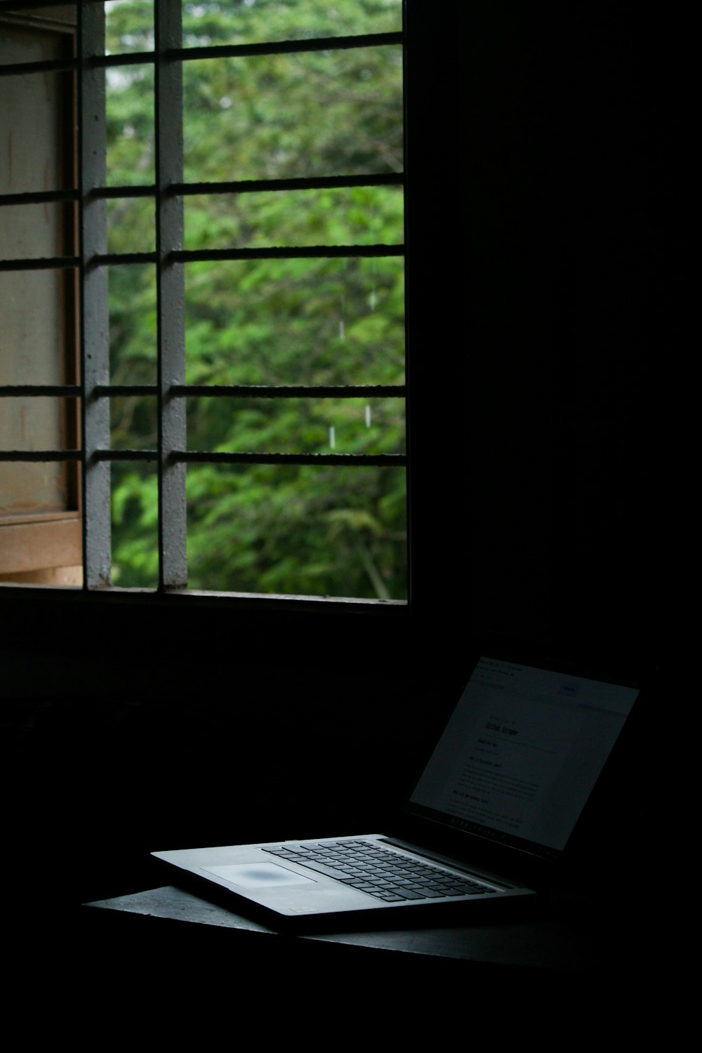 a laptop sits on a table