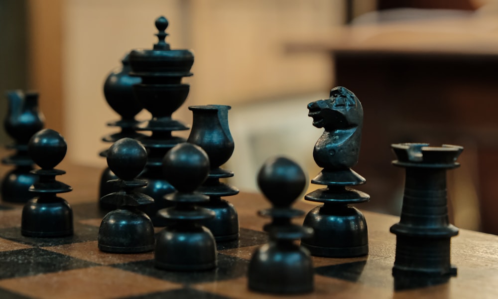 a chess board with black and white chess pieces