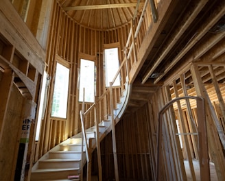 a wooden staircase in a wooden building