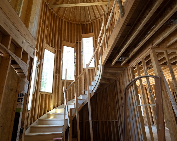 a wooden staircase in a wooden building