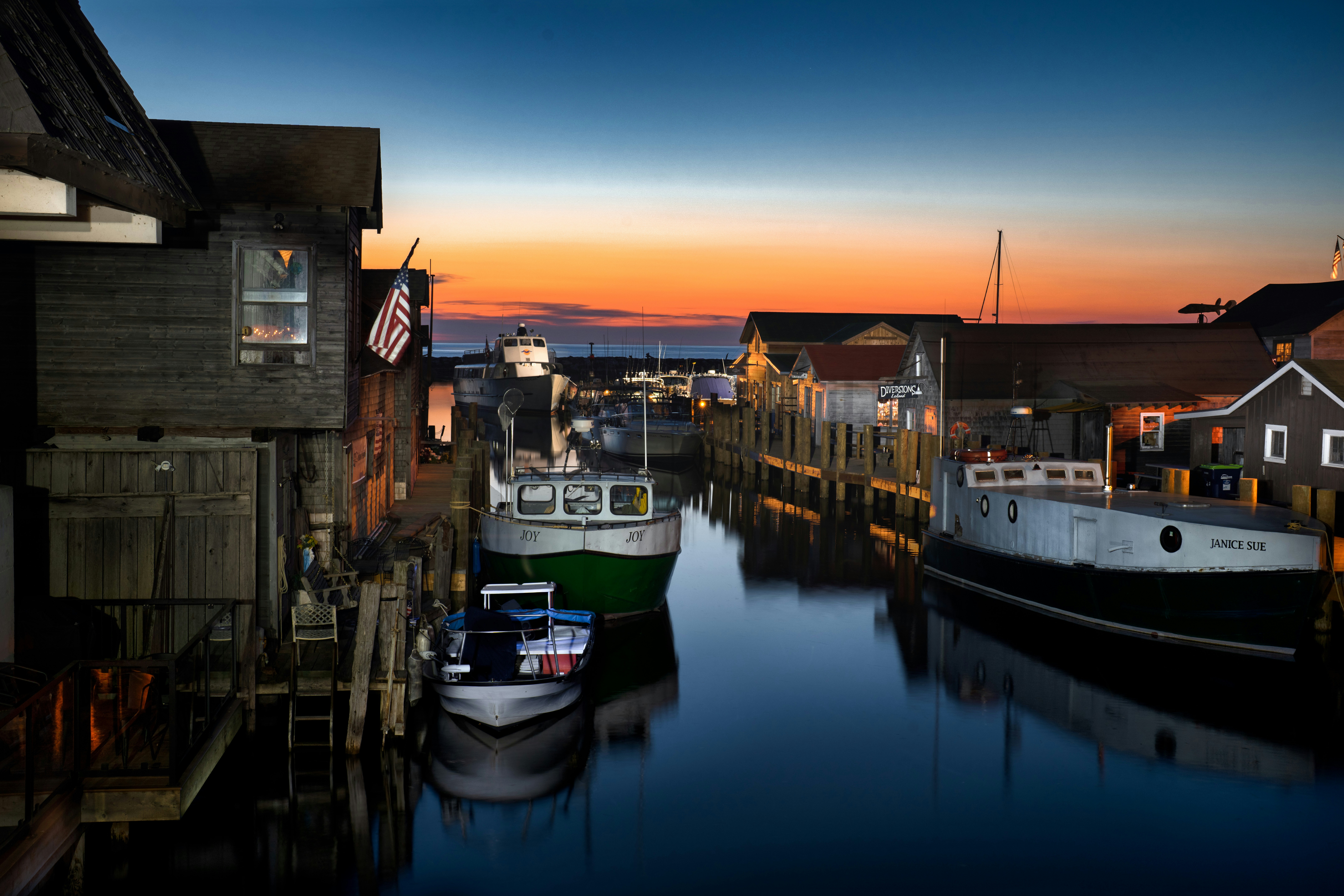 boats docked at a pier