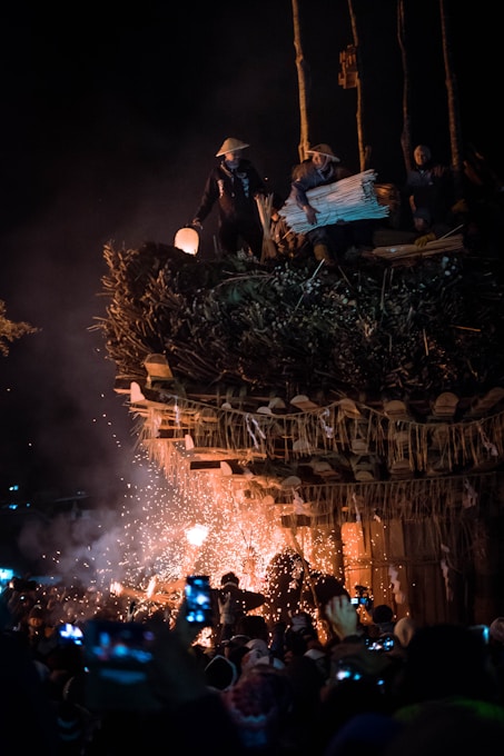 Late on March 12–13, monks draw water from a sacred well called Wakasa-i beneath Nigatsu-do