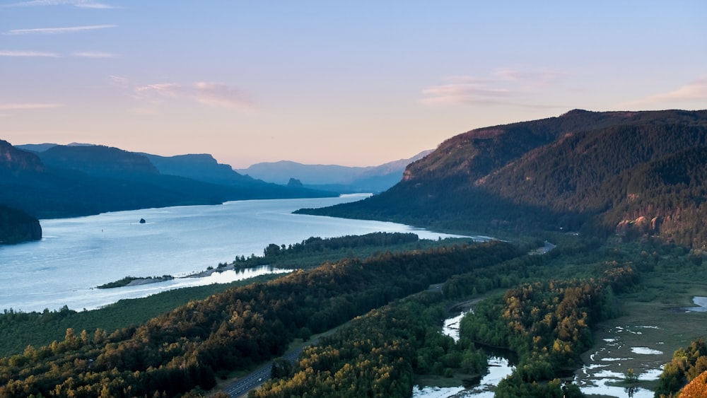 a body of water surrounded by hills