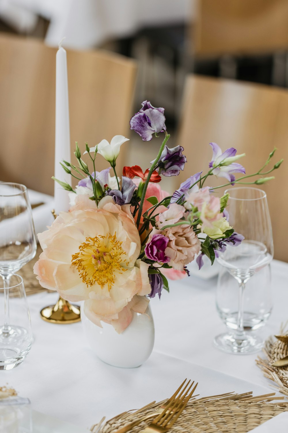 a vase with flowers on a table