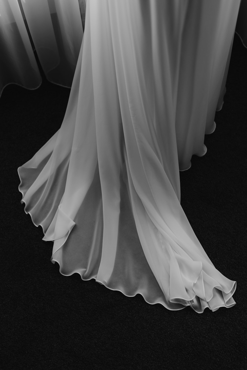 a white dress on a black surface