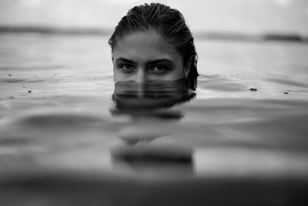 a person's face in water