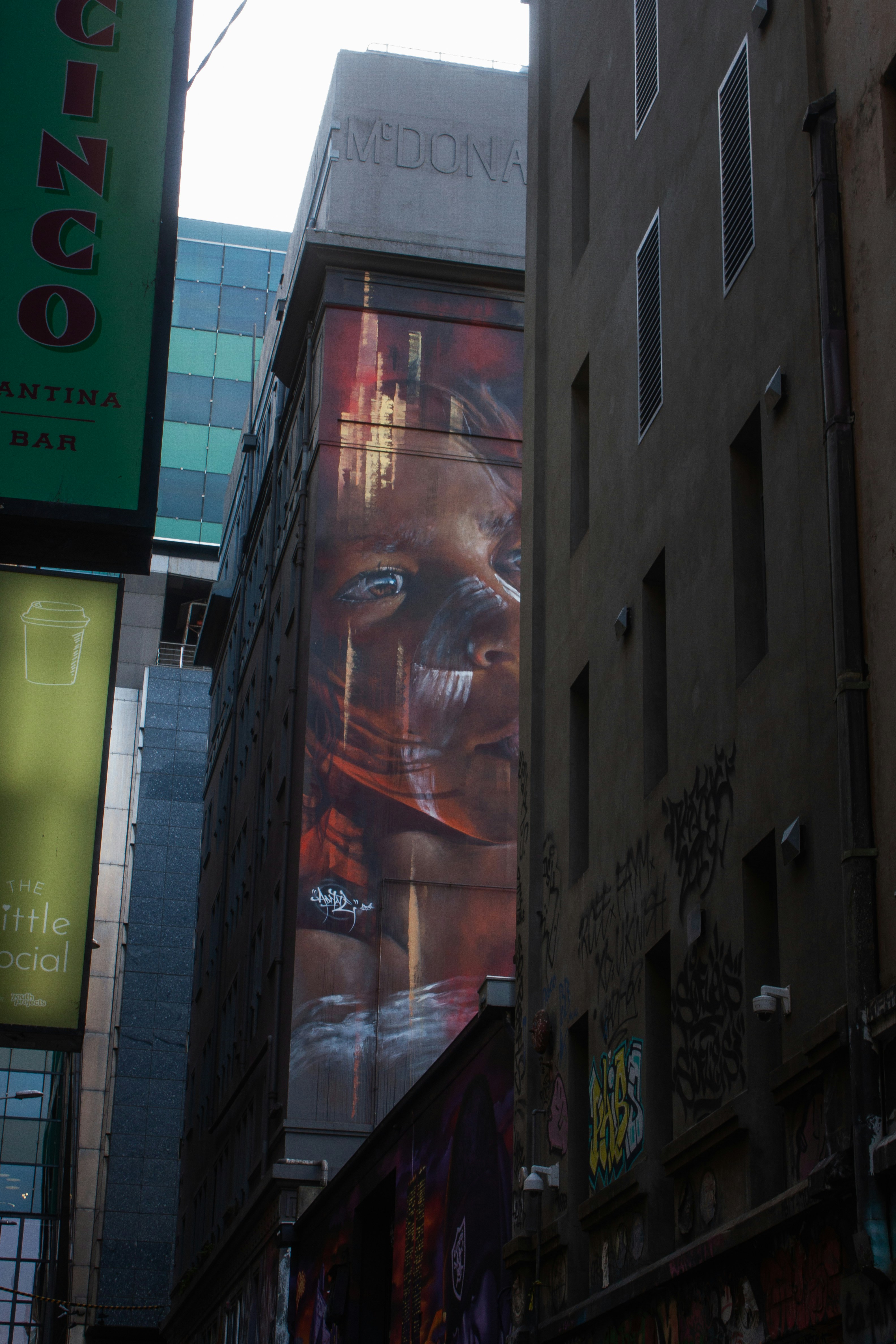 A building with a poster on it photo – Free Art Image on Unsplash