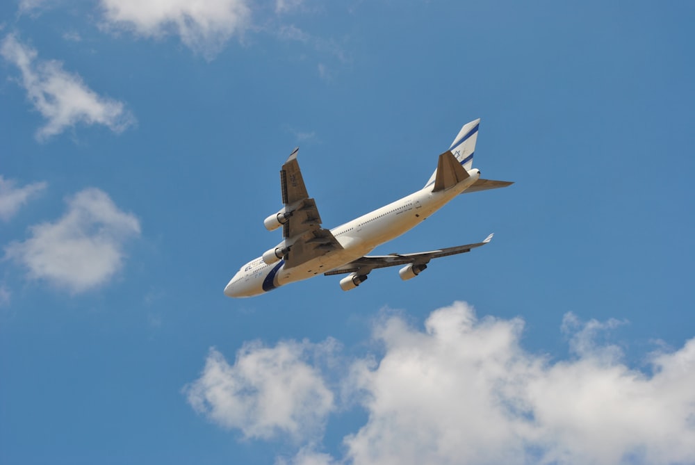 a large airplane flying in the sky