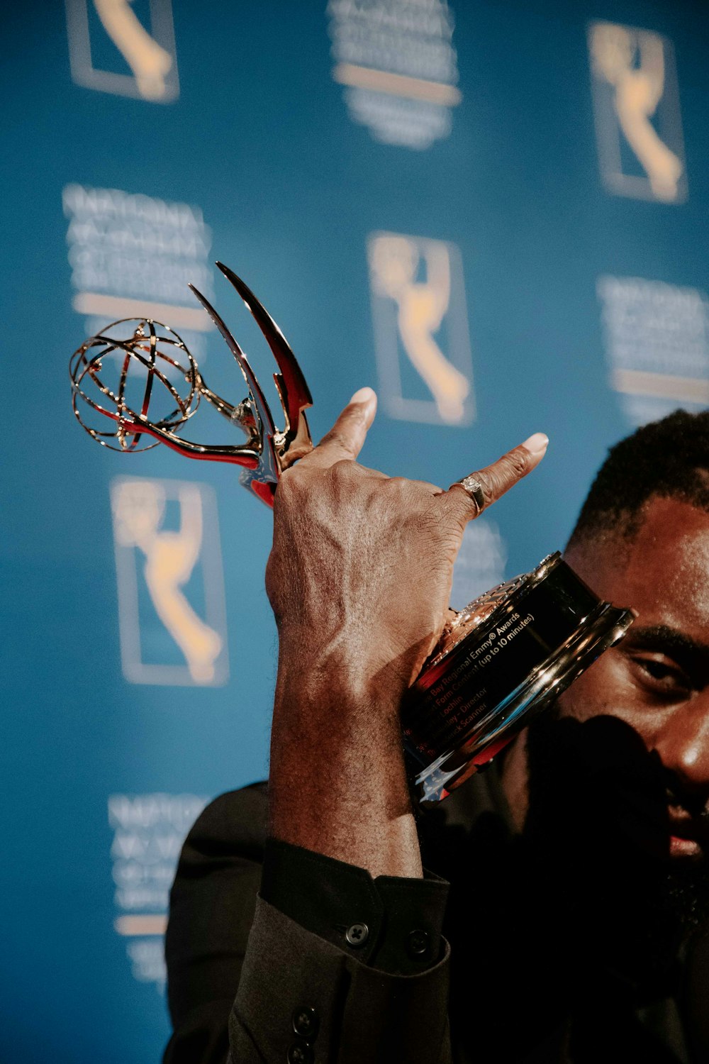 a man holding a basketball hoop